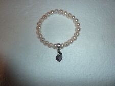 beau bracelet cœur brisé en perle et argent de marque Thomas Sabo,super vintage!