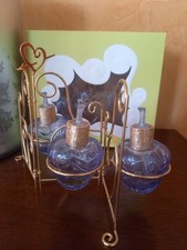 coffret de parfum lolita lempicka 3 vapo de sac: eau de parfum,sur paravent 