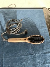 Brosse chauffante lissante