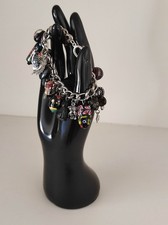 Bracelet vintage couleur argent diverses matières pampilles dont 2 en onyx