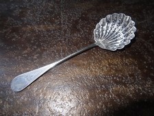 Cuillère à saupoudrer en