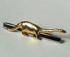 PINCE A CRAVATE vintage ANIMAL DINOSAURE DIPLODOCUS doré et argenté