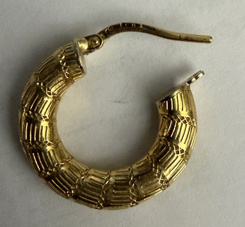 Titre boucle oreille uno - d’oreille,
