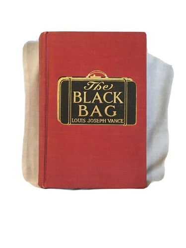 The black bag louis - by,