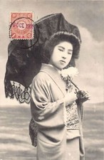 Japan - Geisha - Woman with the embroidered umbrella and chrysanthemum