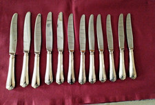 12 couteaux  de table en