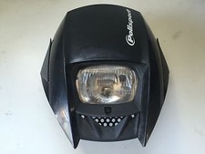 UNE PLAQUE PHARE AVEC SON OPTIQUE PHARE NOIR POLISPORT MOTO ENDURO CROSS SM