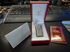 briquet Must de Cartier,plaqué argent,certificat de garantie et révision,boite