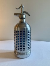 Ancien siphon en verre avec