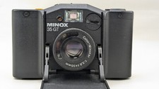 Appareil photo argentique MINOX 35 GT avec étui cuir bordeaux Minox