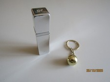 RABANNE : 1 vaporisateur de sac "calandre" et 1 porte clé siglé