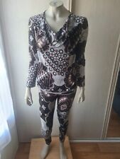 Leonard Paris fuschia ensemble