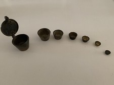 Série de 7 Poids à Godets en bronze  , Époque indéterminée.￼