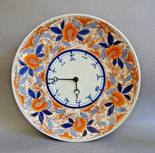 horloge murale mouvement mécanique et porcelaine décor Imari Japon XIXème