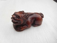 NETSUKE EN BOIS DRAGON MONSTRE