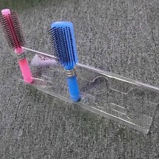 Porte-brosse à cheveux en