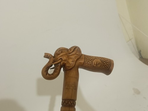 Tête sculptée poignée tête