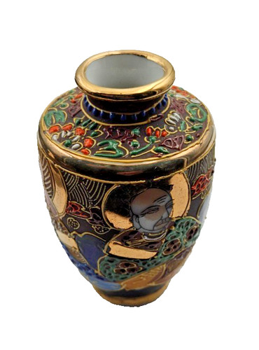 Objet vitrine petit vase - de,