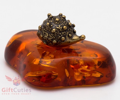 Solid brass amber figurine of - brass,