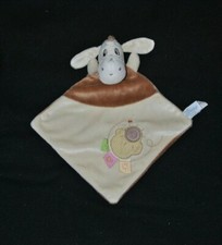 Peluche doudou bourriquet plat