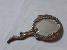 Miroir à main en bronze vers