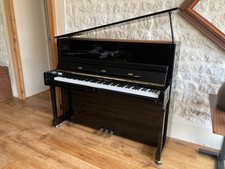 Vends piano de facture Young Chang - noir laqué