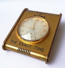 Horloge de bureau ALPHA en laiton 1960's . Mécanique . Suisse .  8 jours