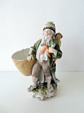 Ancienne statuette Santa Claus à restaurer ,signée aux épées croisées .