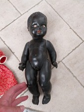 POUPON ANCIEN NOIR EN TERRE DE