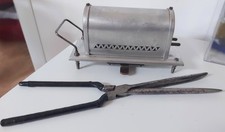 Ancien chauffe fer à friser avec son fer à friser
