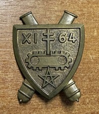 INSIGNE DU XI GROUPE DU 64éme RÉGIMENT D’ARTILLERIE D’AFRIQUE 