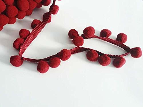 Frange bordée bobble pom - pom,
