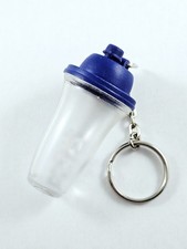 PORTE-CLES - TUPPERWARE - GOURDE Plastique Inclusions Mobiles 3D Miniature