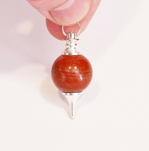 Pendule jaspe rouge flamme - ,