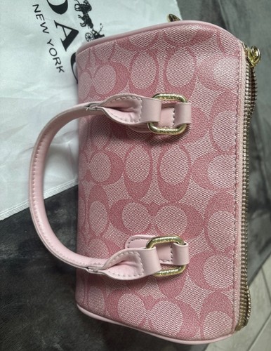 Coach sac bandoulière rose