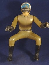 Ancien jouet motard assis