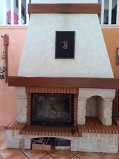 cheminée  marque MERCIER  en pierre et brique 