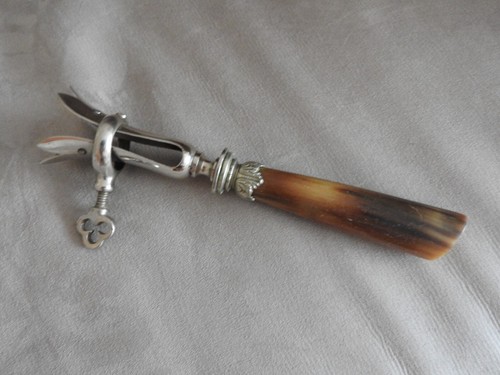 Pince gigot corne couvert - a,