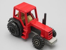 Red Damaged Wheel Tractor -