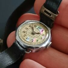 Ancienne Montre femme en argent poinçon crabe, cadran en nacre fonctionne