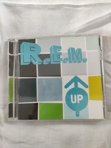 Deux cds up - r.e.m,, reveal