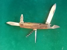 Couteau de poche multi usage de marque C.M 2063 lames en inox .