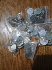 600 grammes de monnaies étrangères variées