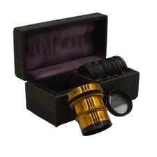 Ancien objectif en laiton Buckler et ses lentilles en coffret pour appareil...
