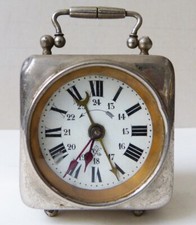 Ancien réveil de voyage