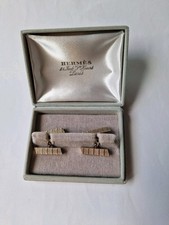 Bouton de manchette signé