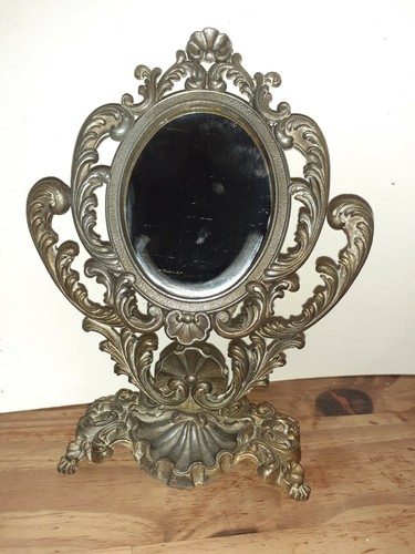 Miroir ancien pivotant sur