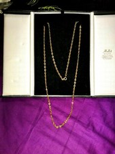 magnifique collier  sautoir or jaune  grain de café poinçon 18k