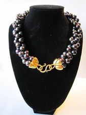 Elégant collier neuf rond 10