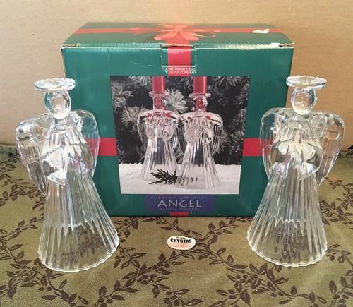 Angel candle holders from - 7",